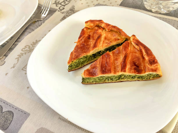 istock Two slices of a tasty savory rustic pie 695451014
