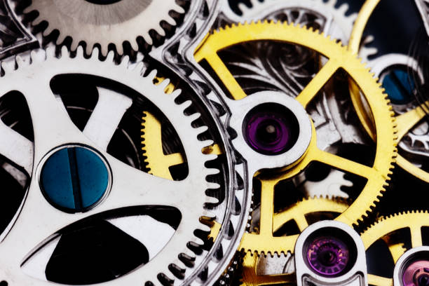 istock Shiny metal clockwork watch mechanism 695455902