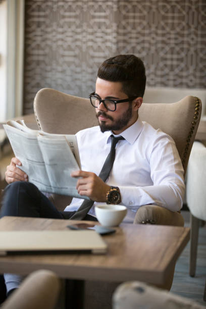 istock Enjoying the free time for coffee and some news 695460136