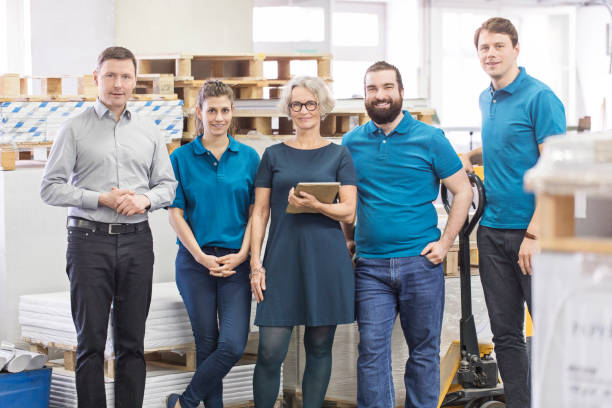 Professional workers standing together in industry