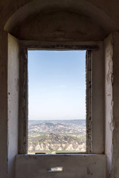 istock Panorama view outside window in Craco 695474224