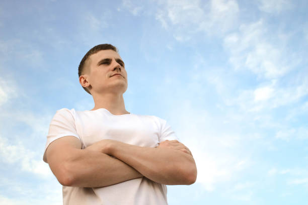 istock The guy folded his arms over his chest, a serious man 695484354