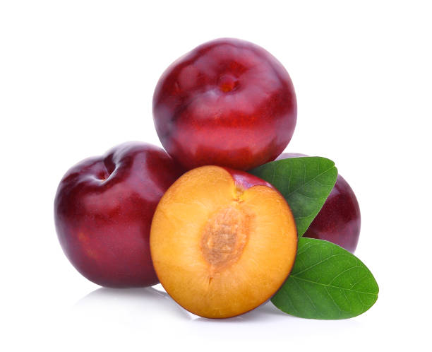 istock red cherry plum with green leaves isolated on white background 695505344