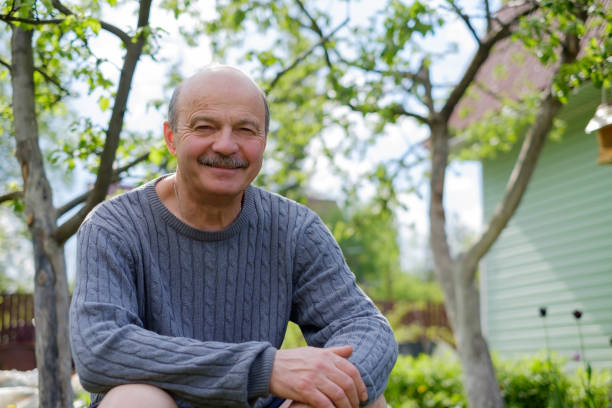 istock Mature man sitting in countryside 695508622