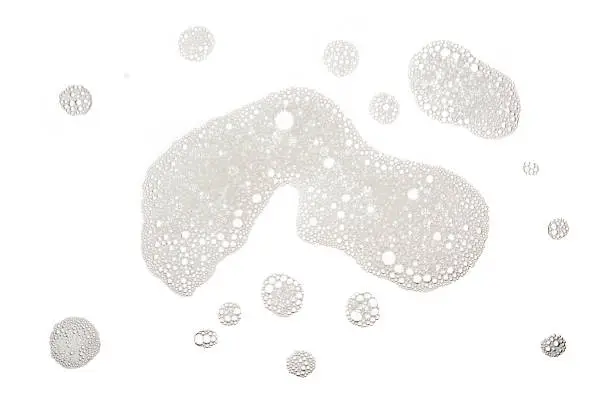 Photo of Group of foam bubble and stain from soap or shampoo washing isolated on white background on top view photo object design