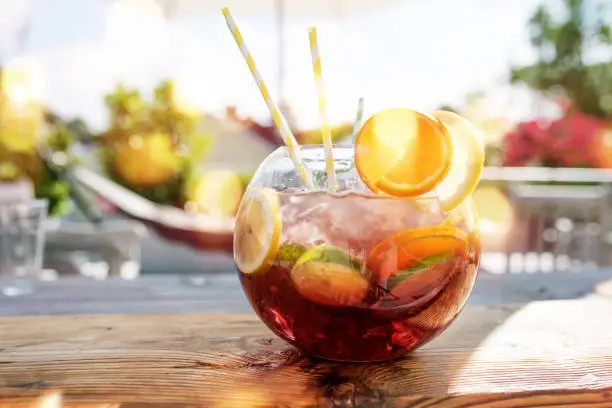 Sangria punch in a glass jar with fruits