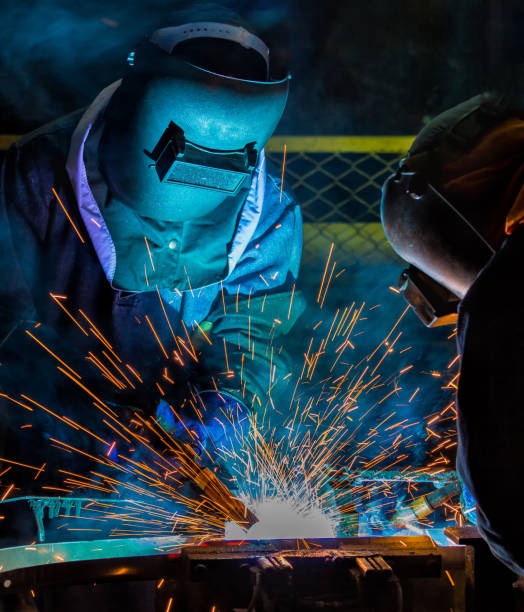 istock Welders team are welding automotive part in assembly line 695513246