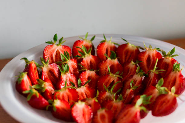 istock Beautiful strawberries isolated on white background. 695519090