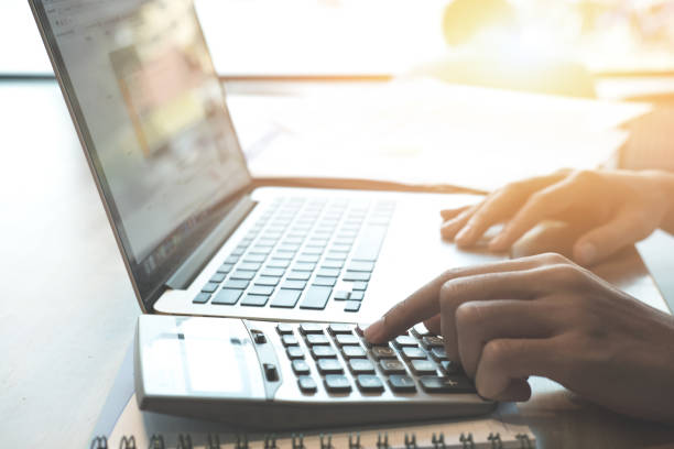 istock Man Analysis Business Report. Accounting 695519322