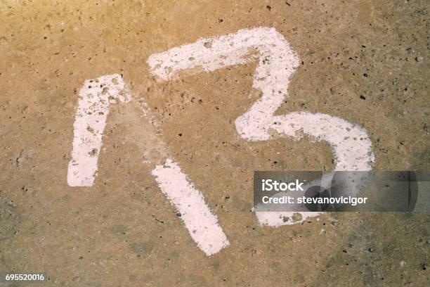 Number Thirteen On The Concrete Floor Stock Photo - Download Image Now - Abstract, Bad Luck, Concrete