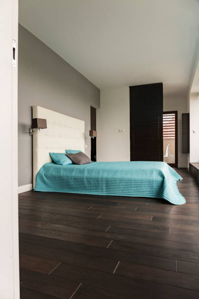 istock Bedroom with wooden floor 695523092