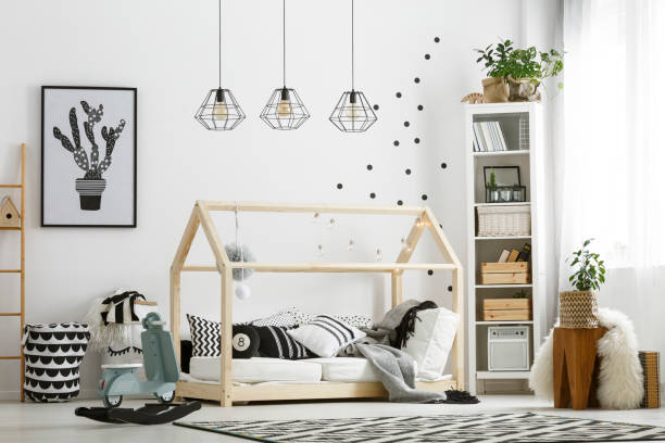istock Bed in shape of house 695527884