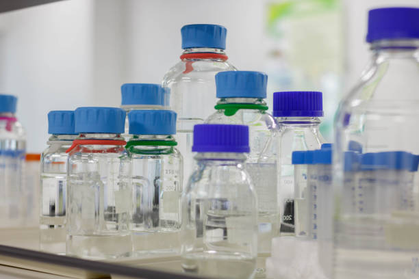 istock Glass bottles used in scientific experiments, laboratory equipment 695527986