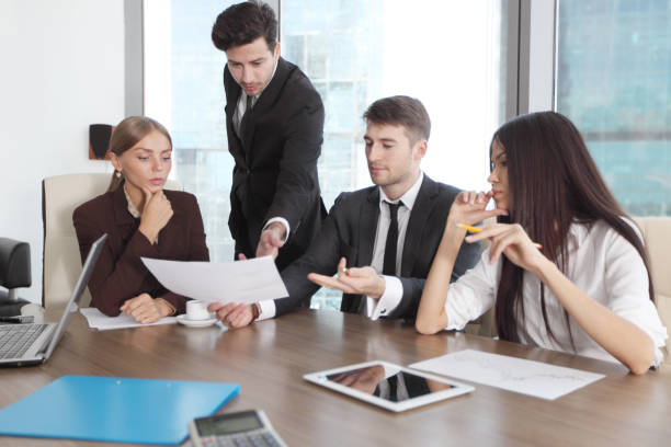 istock Business people working together at a meeting 695530588