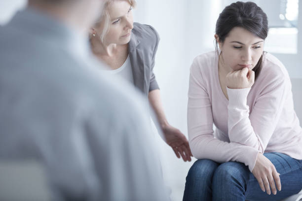istock Worried woman on therapy 695530976