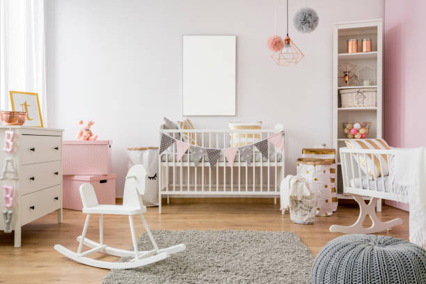 White poster mockup over crib White poster mockup over crib in pastel baby room nursery bedroom stock pictures, royalty-free photos & images