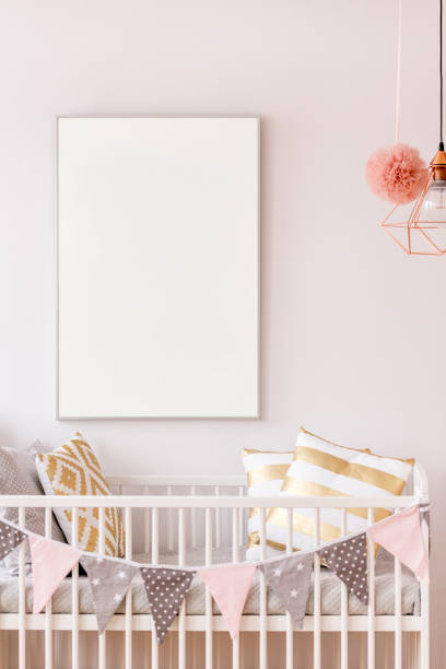 istock Baby crib with white poster mockup 695533922