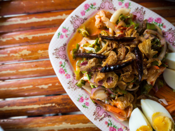 istock Wing Bean Shrimp Salad,Thai food. 695537446