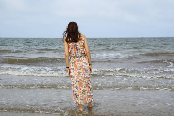 istock Young girl on the beach 695538160
