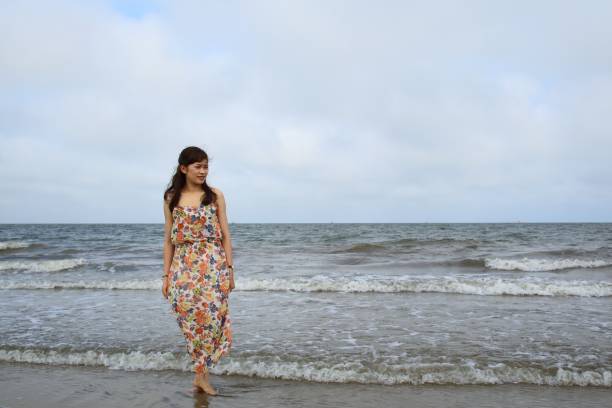 istock Young girl on the beach 695538294
