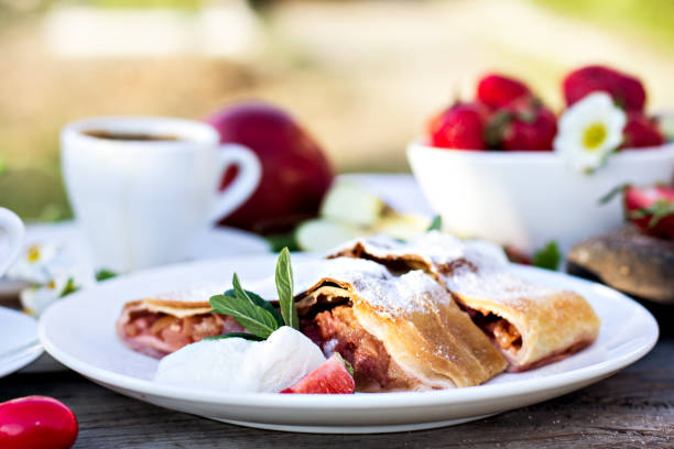 istock Strudel with apples and strawberries. 695545626