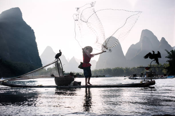 istock Fisherman of Li River 695545692