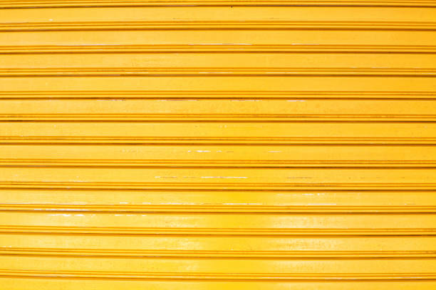 istock yellow metal sliding door 695548468