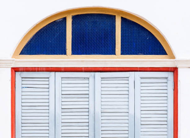 istock Wooden folding doors with the color glass frame. 695551804
