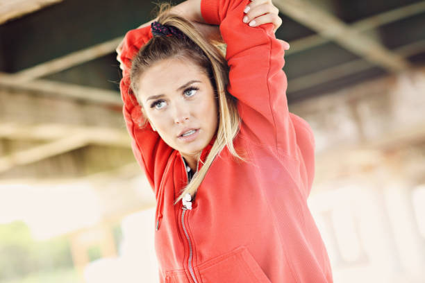 istock Woman jogging on the beach 695555292