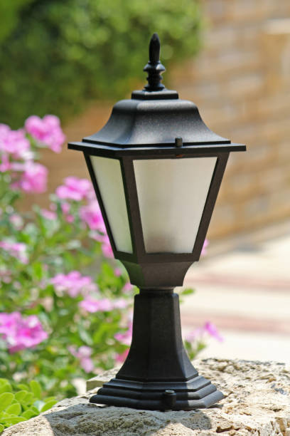 istock Small decorative street lamp in the yard 695558396