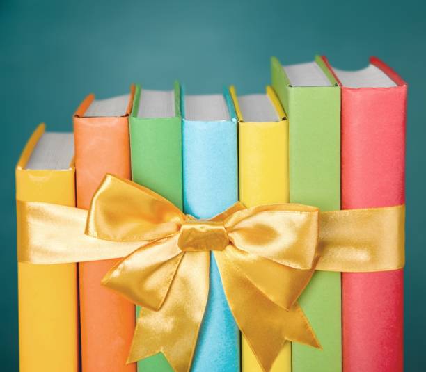 Book Stack With Ribbon Mark 1,100+ Stack Of Book With Ribbon Stock Photos, Pictures & Royalty-Free ...