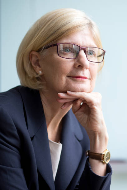 istock Curious senior lady attracted by meeting 695559626