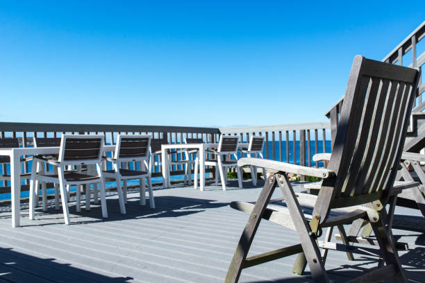 istock Sea view terrace with blue sky 695561320