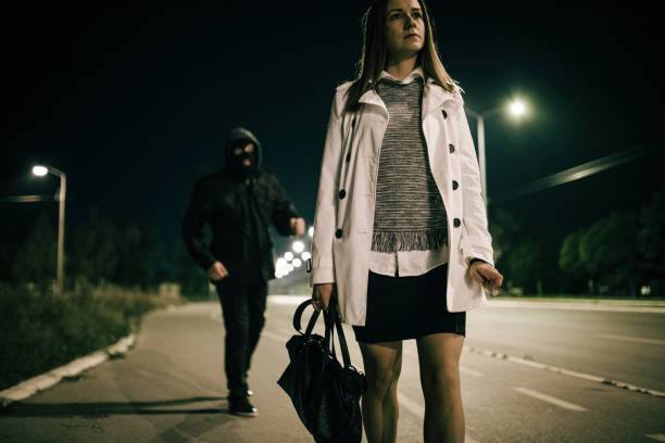 istock Alone woman and the thief 695566024