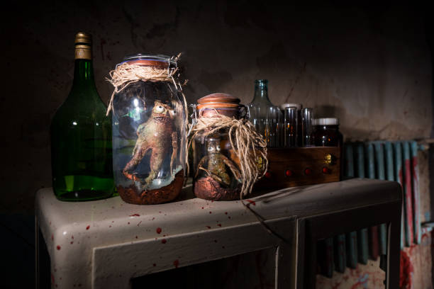 istock Horrible dead creatures inside jars in a Halloween horror concept 695566682