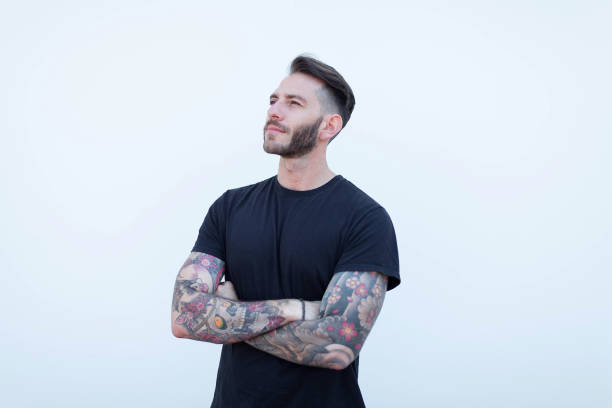 istock Portrait young man arms folded 695570488