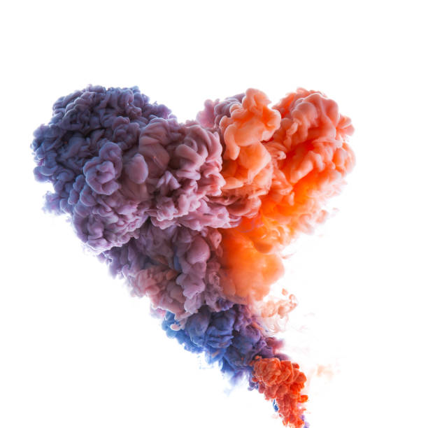 Flow of colorful paint underwater