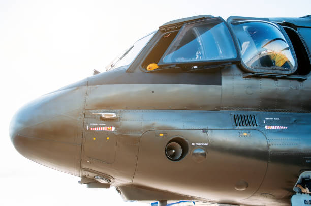 istock Nose and cockpit of the helicopter pilot. Side view. 695580884
