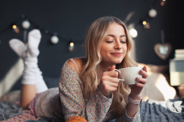 istock Cheerful girl with coffee 695582296