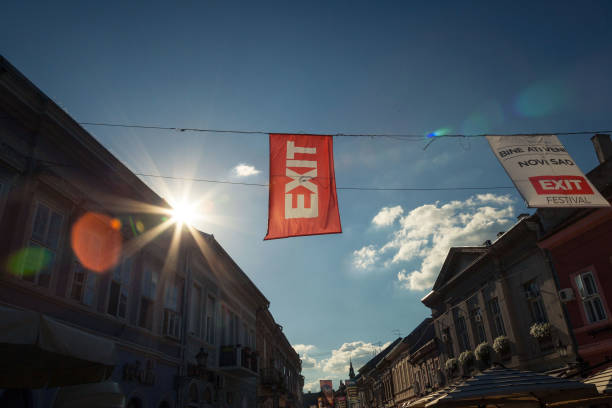 Banners and flag in Novi Sad (Serbia) main streets announcing the upcoming Exit festival, held every year in the city, one of the biggest music festival in Balkans Pictures of flags promoting Exit Festival, one of the most famous festivals in Central and Southeastern Europe, held every year in Petrovaradin fortress in Novi Sad, second city of Serbia Petrovaradin stock pictures, royalty-free photos & images