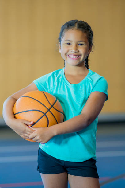 istock Holding a Basketball 695603996