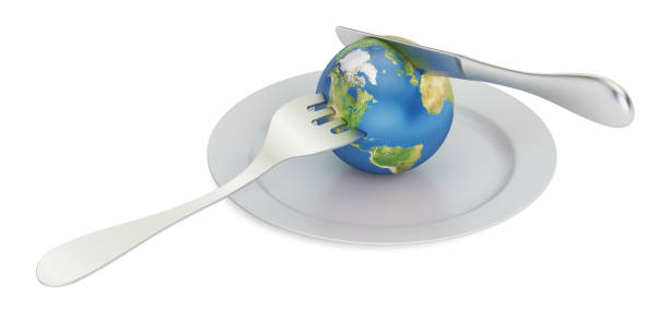 istock Earth globe on a plate with fork and knife, 3D rendering isolated on white background 695604232