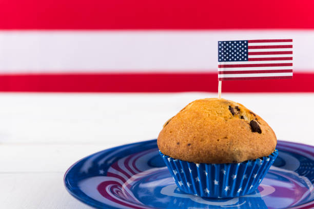 istock Cute cupcake with american flag 695604488