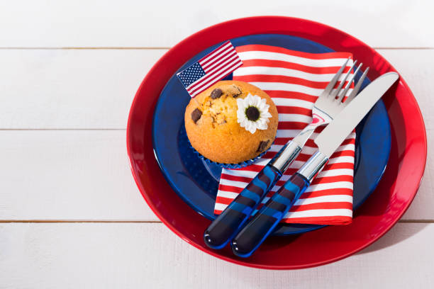 istock Beautiful blue red and white patriotic table setting 695604574