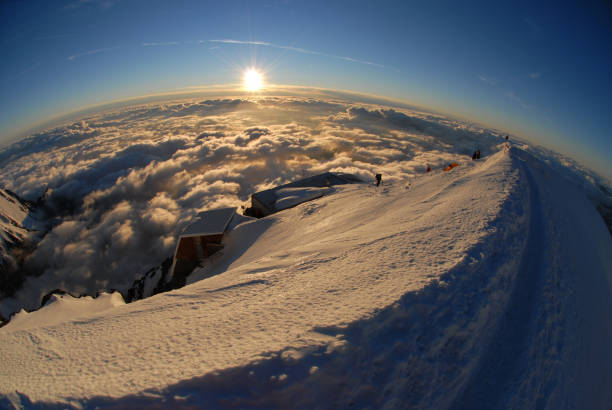 Mont Blanc, -Spectacular fisheye view from above the clouds of the mountainranges surrounding Chamonix, France.