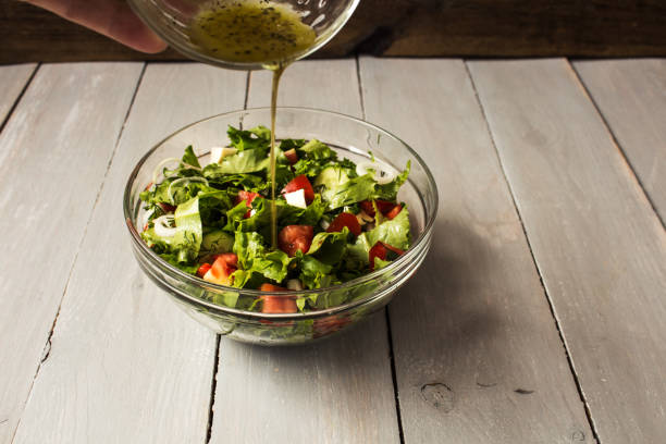 istock bowl of fresh salad with salad dressing 695611714