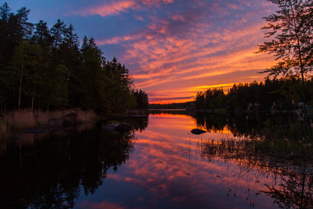 istock Colorful sunset on the lake 695611784