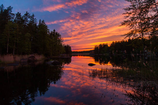 istock Colorful sunset on the lake 695611880