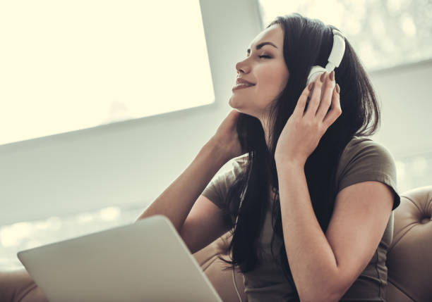istock Beautiful girl with gadget 695625634