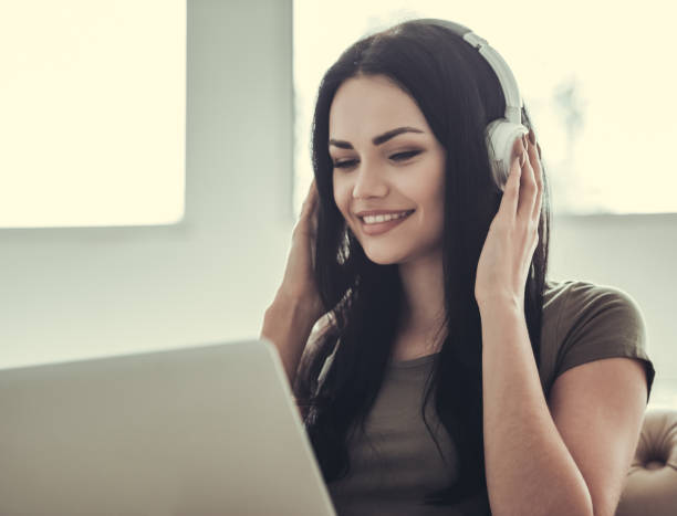 istock Beautiful girl with gadget 695626620